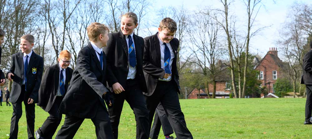 A photo of West Hill School students socialising together